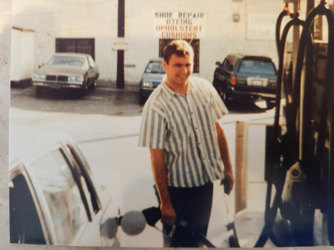 Charly pumping gas.