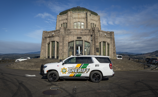 Patrol vehicle with new branding parked outside of the Vista House.